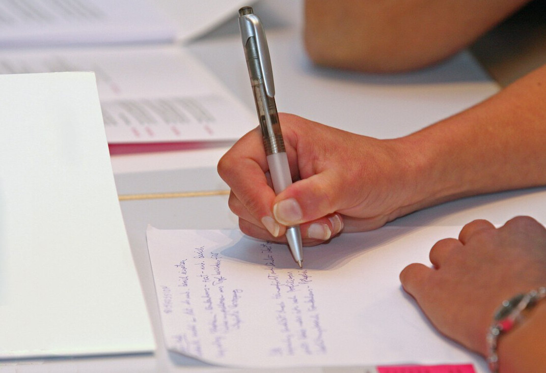 young person writing letter