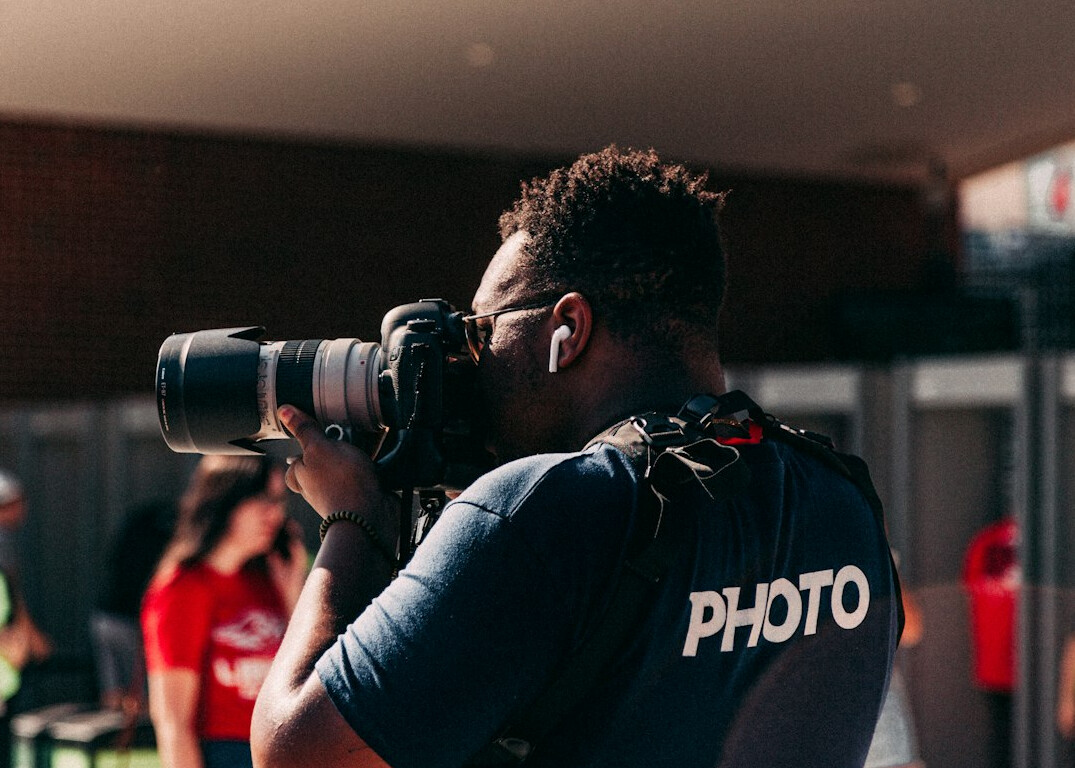 documentary photographer capturing moment