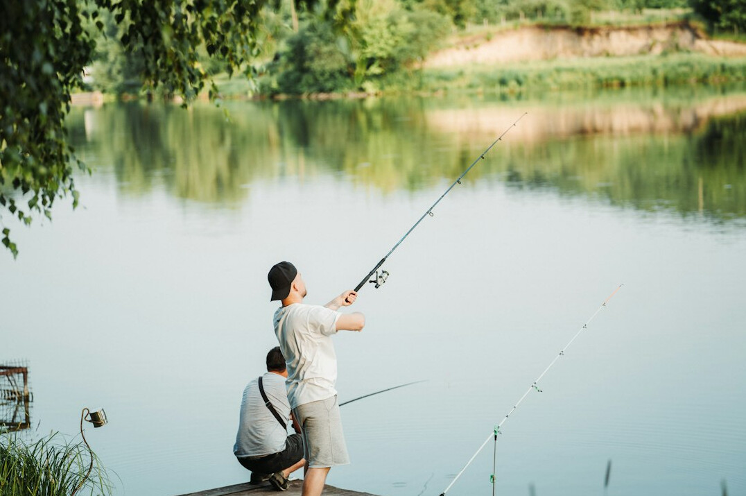 father and daughter fishing