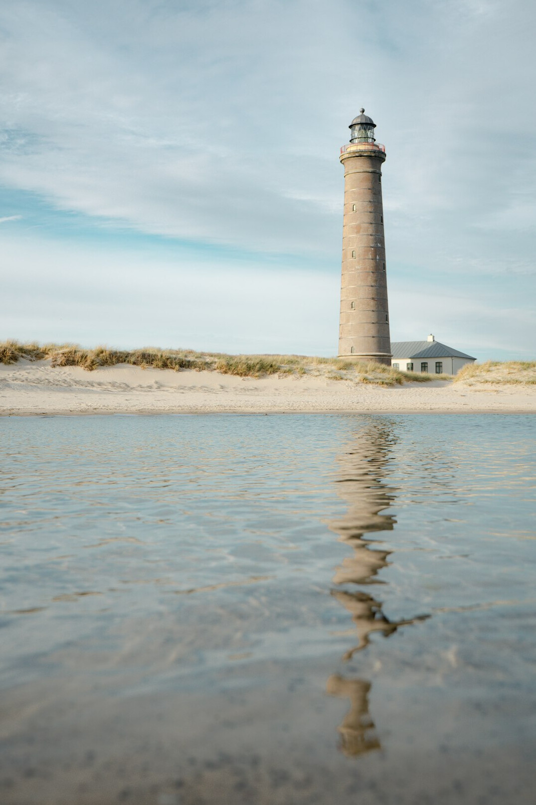 Lighthouse and sand dunes at Skagen Denmark